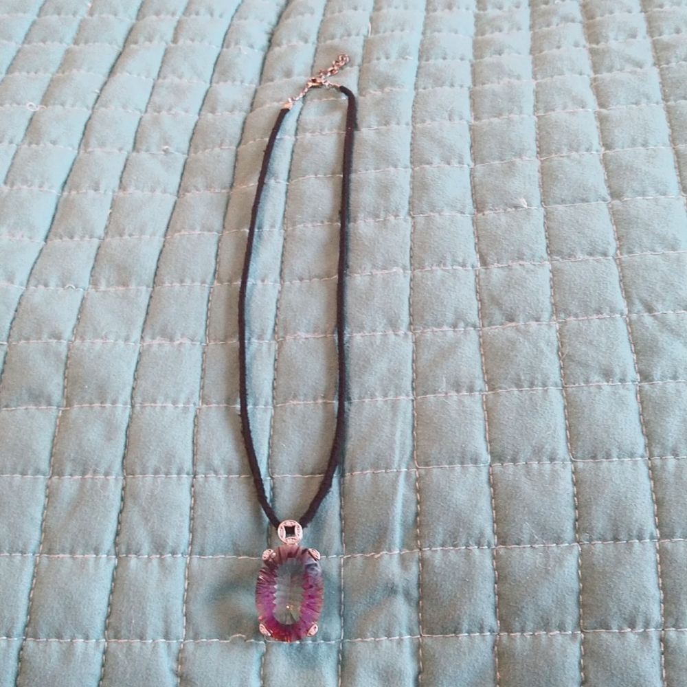 Topaz gemstone (lab created) on a black velvet type choker.